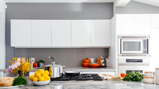 A kitchen brimming with decorations, utensils, and delicious ingredients